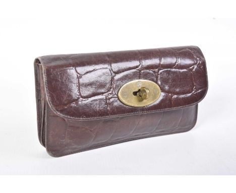 A Mulberry brown crocodile print leather walletOf shaped rectangular form, with fold over top with zipped interior compartmen