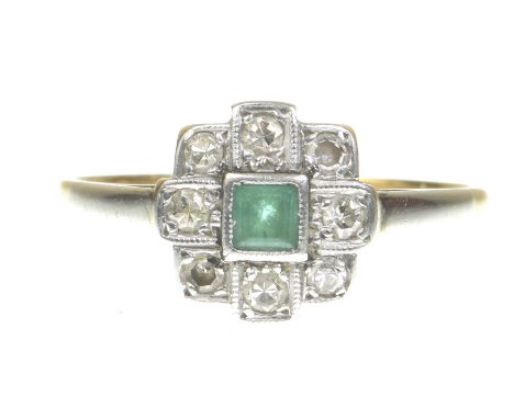 An early 20th century emerald and diamond panel ringCentering a square step-cut emerald to a single-cut diamond surround, sha