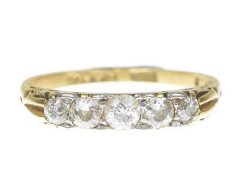 A Victorian diamond five stone ringThe graduated old-cut diamonds, to a scroll gallery, stamped 18ct, total diamond weight ap
