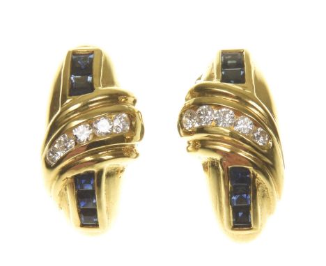 A pair of sapphire and diamond earringsThe central graduated row of round brilliant-cut diamonds, flanked by square step-cut 