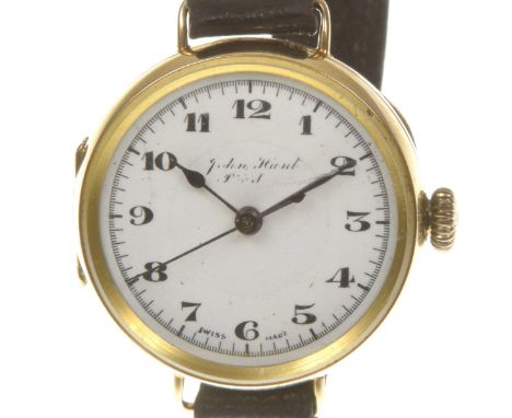 An early 20th century 9k gold manual wind wrist watchThe signed white dial, with black Arabic numerals and an outer minute tr