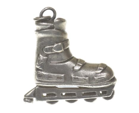 Tiffany & Co.: A silver pendantRealistically modelled as a roller blade, signed Tiffany & Co., length including bale 47cm