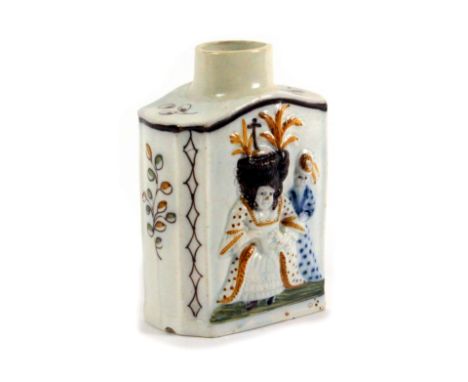 A Staffordshire pearlware tea caddy, late 18th Century, of silver shape, moulded in relief with Macaroni figures, 12cms high.