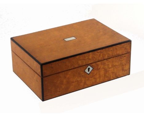 A burr, maple and ebony bordered sewing box of rectangular form, with mother of pearl escutcheon and lid tablet, circa 1870, 