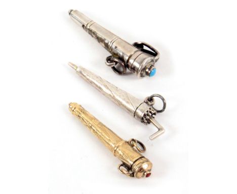 Three small 19th Century pin or needle cases, each of tapering cylinder form and with hinged cover comprising an engraved gol