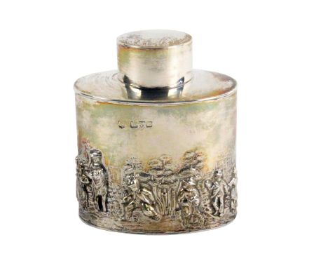 A silver oval tea caddy, decorated in relief with figures, 8cms high, Chester 1908.          