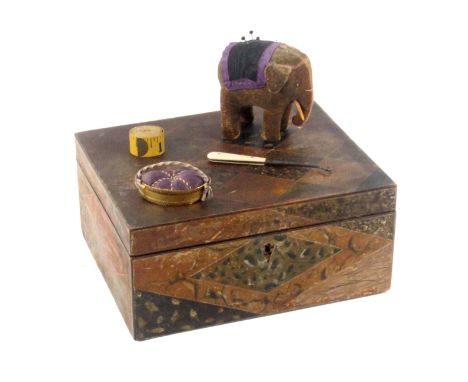 An unusual rectangular sewing box, circa 1820, the exterior painted to simulate geological specimens in diamonds and spandril