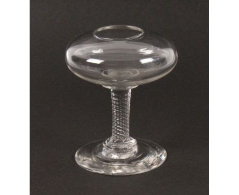 A late 18th Century/early 19th Century lace maker's glass lamp, of diminutive proportions, the bowl on wrythen stem to a circ