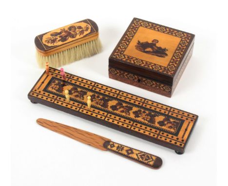 Tunbridge ware - four pieces, comprising a floral mosaic cribbage board raised on four bun feet, 24cms, a paper knife with ge