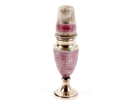 An early 20th Century silver and pale purple enamel thimble etui, the circular base to a vase form body, the thimble unscrewi