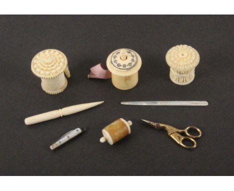 A mixed lot - sewing, comprising three 19th Century ivory tape measures, one lacking base, largest 3cms, a stiletto, cylinder