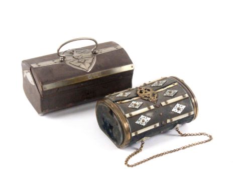 Two continental sewing companions, comprising a grey leather example with white metal mounts, double hinged top, red silk int
