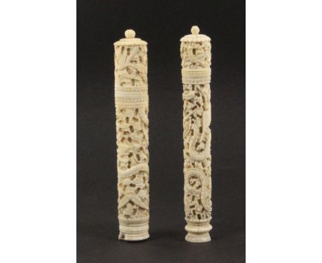 Two Chinese 19th Century carved ivory cylinder form netting cases, each of tapering form and typically carved with dragons, b