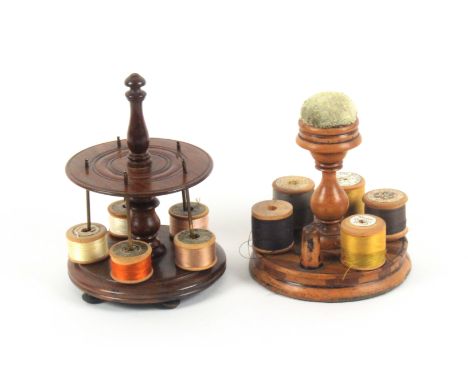 Two small 19th Century wooden reel stands, comprising a turned sycamore example, the base in alternate light and dark woods w