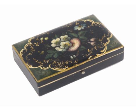 An early 19th Century papier mache etui of rectangular form with a full complement of tools, the hinged lid painted with flow