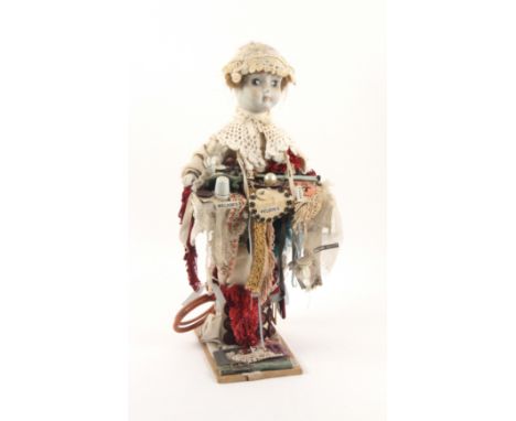 A ceramic headed doll for a shop window, in the form of a pedlar doll with tray of vintage 1930's sewing and costume accessor