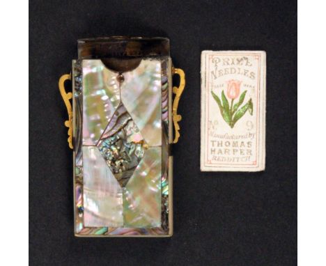 An unusual mother of pearl and abalone shell, gilt and brass mounted needle packet case, the interior of the hinged lid stamp