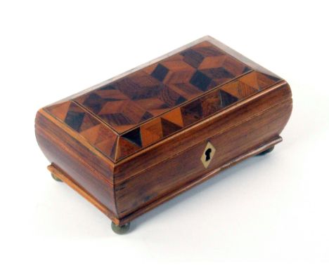 A rosewood Tunbridge ware box, the convex moulded base with diamond ivory escutcheon and raised on four brass ball feet, the 