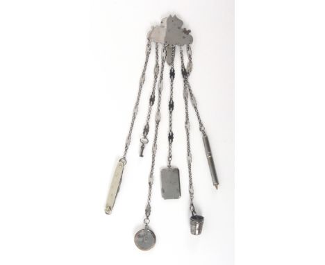 A polished steel chatelaine, the hook with shaped mount to six chains with pierced panels mounted with a later turnbuckle twi