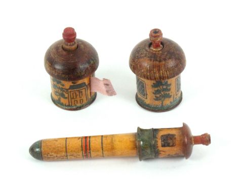 Three early painted Tunbridge ware white wood cottage form sewing tools, comprising a thatched circular cottage tape measure,