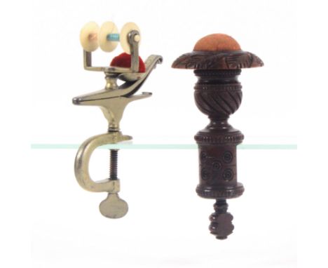 Two 19th Century sewing clamps, comprising a plated metal example, the 'C' form frame below a sprung clip and mounted with a 