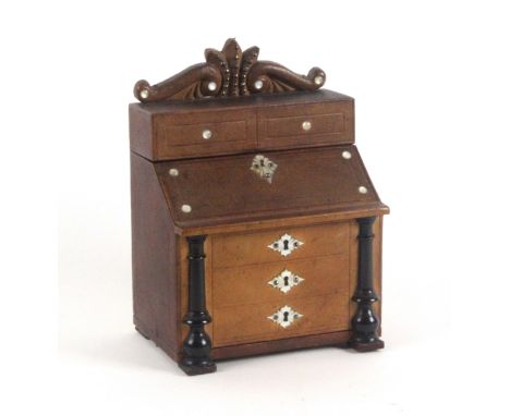 An unusual leather and pearl mounted musical sewing box in the form of a bureau, French or German, circa 1880, the front as t
