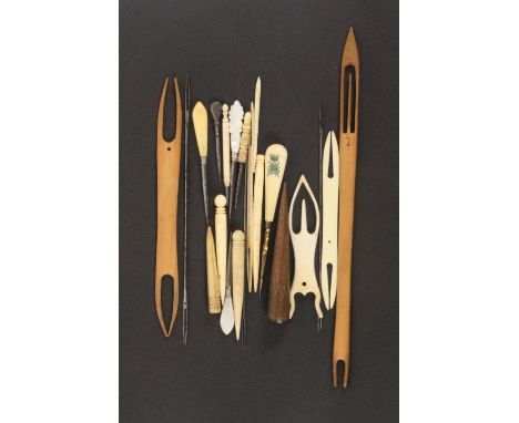 A collection of stilettos, fids and netting tools, including 19th Century ivory pieces.       (21)                           