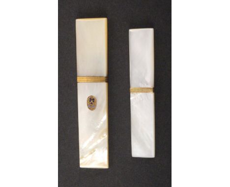 Two Palais Royal mother of pearl rectangular needle cases, comprising an example with gilt metal and enamel oval pansy motif,