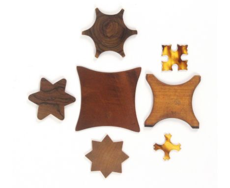 A collection of thread winders, comprising six variant mother of pearl examples, largest 4.2cms, two tortoiseshell, two olive