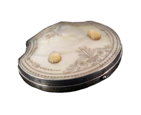 A fine late 18th Century French Palais Royal sewing case of shell form, the mother of pearl lid engraved with leaves and scro