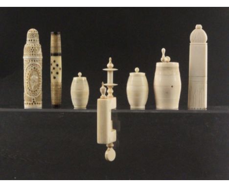 A mixed lot of 19th Century ivory and other sewing tools, comprising three ivory cotton barrels, the largest with coffee grin