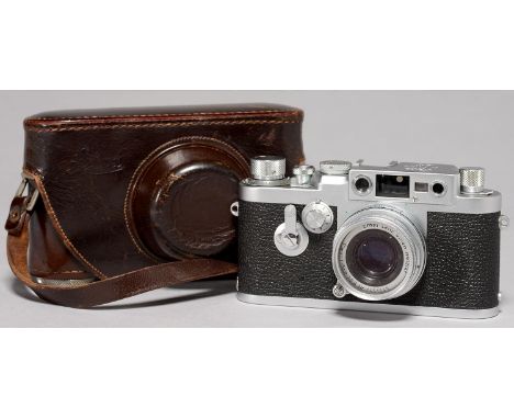 LEICA. A LEICA IIIg CAMERA 904008, 1957, WITH MAKER'S ELMAR F2.8 5CM LENS 1451543, MAKER'S LEATHER EVEREADY CASE A little use