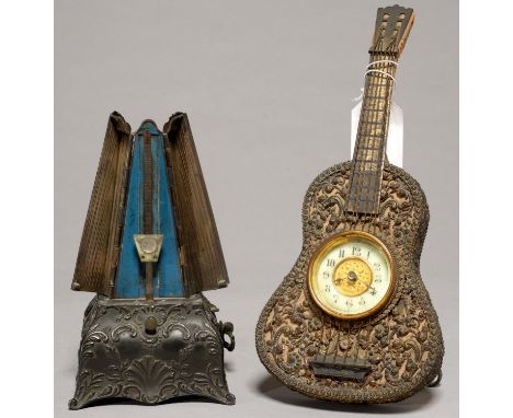 A DECORATIVE SILVERED METAL AND WOOD GUITAR SHAPED STRUT TIMEPIECE, THE BRITISH UNITED CLOCK CO LIMITED AND A ROCOCO REVIVAL 
