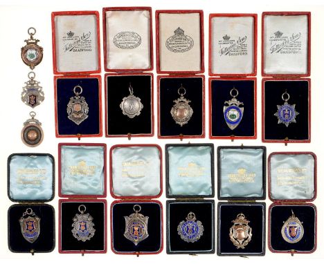 SPORTING INTEREST. FOURTEEN SILVER OR SILVER AND ENAMEL MEDALS OF DERBYSHIRE FOOTBALL ASSOCIATION AND MATLOCK AND DISTRICT FO