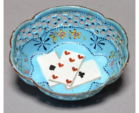 A GEORGE III SOUTH STAFFORDSHIRE ENAMEL COUNTER TRAY, C1780, PAINTED WITH THREE PLAYING CARDS AND STYLISED FLOWERS BENEATH PI