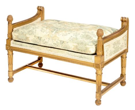 A FRENCH GILTWOOD WINDOW SEAT, C1900, THE SWEPT ENDS TERMINATING IN PINECONES, ON STOP FLUTED LEGS, SEAT HEIGHT 53CM INCLUDIN