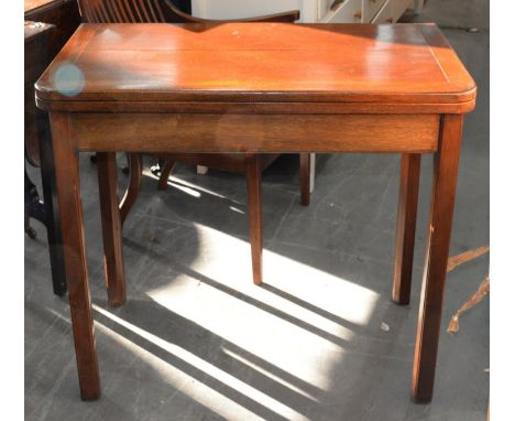 A MAHOGANY CARD TABLE, SECOND QUARTER 20TH C, 75CM H; 47 X 92CM Shrinkage crack to top