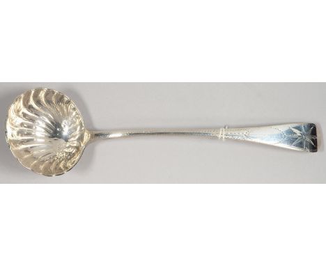 A VICTORIAN SILVER SOUP LADLE OF UNUSUALLY HEAVY GUAGE, BRIGHT CUT OLD ENGLISH STAR PATTERN WITH SHELL BOWL, BY JOSIAH WILLIA