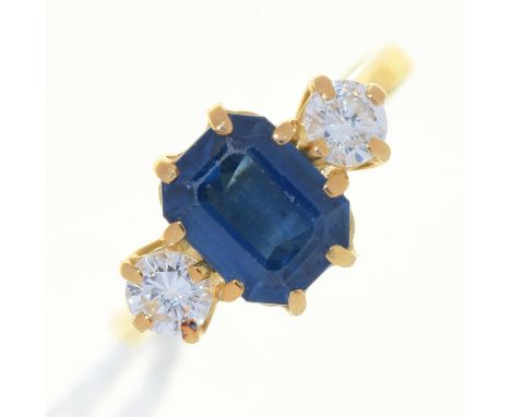 A SAPPHIRE AND DIAMOND THREE STONE RING IN 18CT GOLD, LONDON, DATE LETTER RUBBED, 3.7G, SIZE L ½ Sapphire with slight wear on