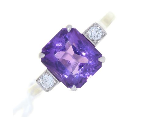 AN AMETHYST AND DIAMOND THREE STONE&nbsp; RING, IN WHITE GOLD MARKED 18CT PT, 2.6G,&nbsp; SIZE K Good condition