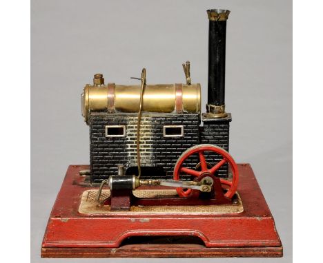 A GERMAN LIVE STEAM STATIONARY ENGINE AND BOILER, DOLL &amp; CIE, 1930S ON A LATER WOODEN BASEBOARD, 30CM H Boiler with minor