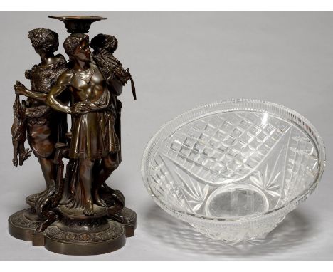 A FRENCH BRONZE SCULPTURE OF TWO BAREFOOT GLEANERS AND A YOUTH CARRYING A HARE, C1880, DIVIDED BY THREE SCROLLING FOLIATE UPR