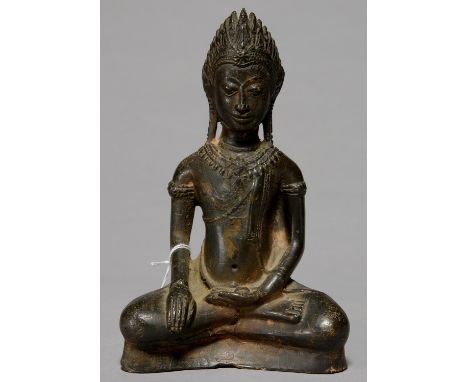 A SOUTH EAST ASIAN BRONZE SCULPTURE OF A BODHISATTVA, 19TH C, 20.5CM H Much encrusted with dust and dirt, the underside of th