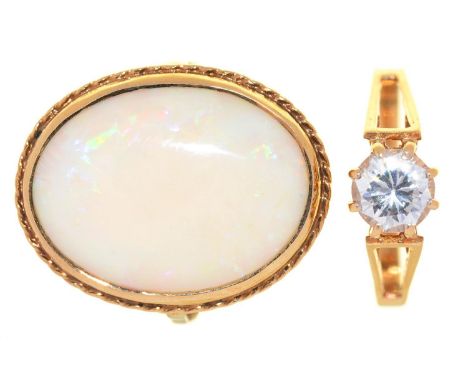 AN OPAL RING, IN 9CT GOLD, AND A WHITE STONE SOLITAIRE RING, IN 9CT GOLD,&nbsp; 5.4G,&nbsp; SIZES L &amp; M Good condition