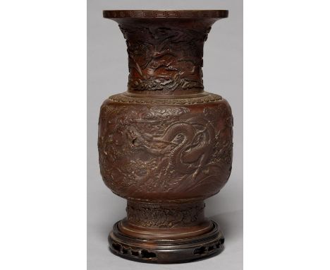 A CHINESE BRONZE DRAGONS VASE, LATE 19TH C, WITH LAPPETTED SHOULDER, THE FLARED NECK CAST WITH EGRETS, ONE DRAGON WITH APPLIE