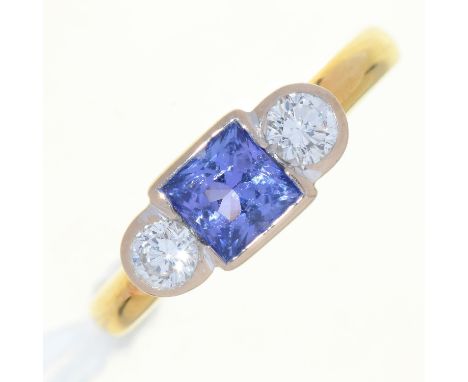 A TANZANITE AND DIAMOND THREE STONE RING, IN 18CT GOLD,&nbsp; DATE LETTER INDISTINCT, CONVENTION MARKED, 3.4G, SIZE L Tanzani