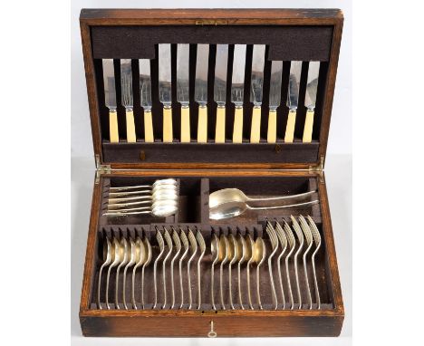 AN EPNS TABLE SERVICE FOR SIX, OLD ENGLISH PATTERN, IN OAK CANTEEN Light wear scratches only. Lid of canteen scratched