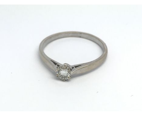 An 18ct white gold and diamond 0.25ct solitaire ring (W), 3.4g