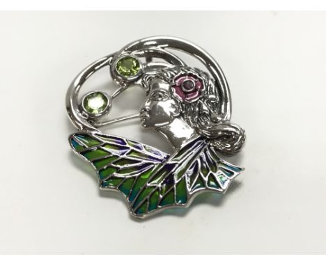 A silver Flora brooch / pendant set with peridot, ruby and multicoloured plique a jour enamel.