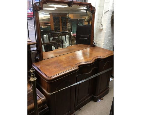 A Victorian walnut sideboard with a raised mirrored back above drawers and cupboards - NO RESERVE